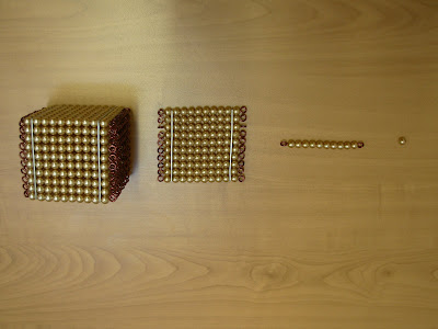 NAMC montessori moment student inspiration golden bead math materials