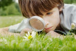 NAMC Montessori Inspired Age Appropriate Toys 3-6 boy with magnifying glass