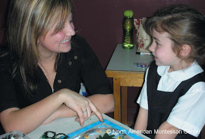 NAMC montessori philosophy praise vs encouragement NAMC montessori teacher and girl