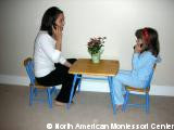 importance NAMC montessori practical life activities classroom talking on phone