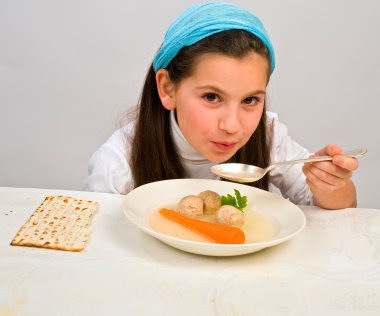 NAMC montessori classroom activities cultural curriculum Jewish passover girl eating soup