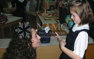 NAMC montessori parenting consequences positive discipline girl and teacher