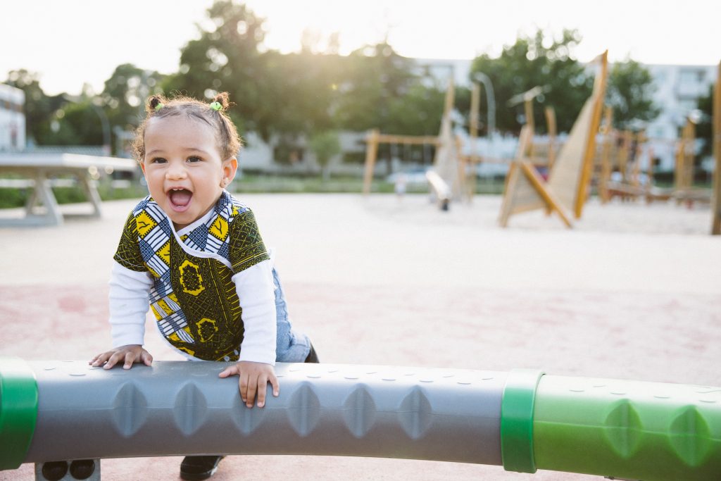 toddler in Montessori playground outdoors