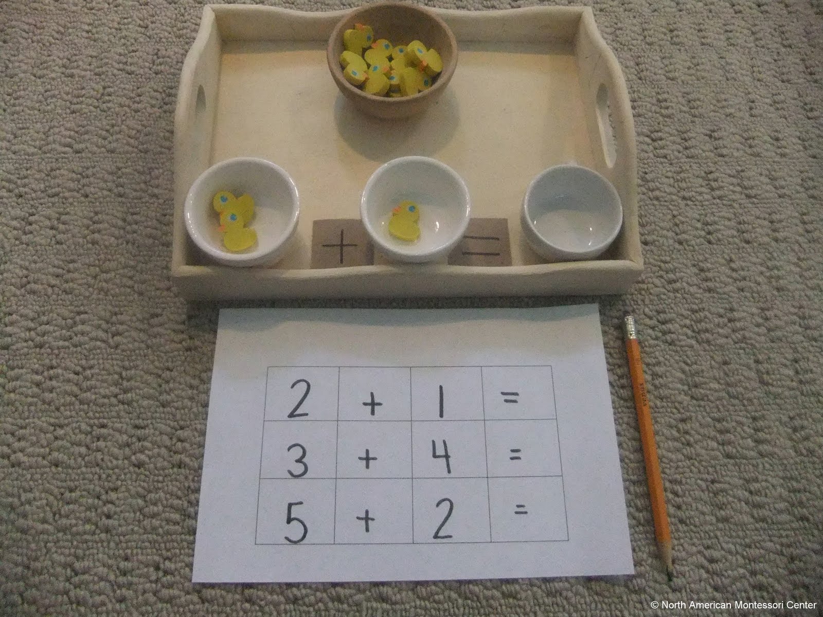 NAMC montessori preschool classroom Easter curriculum activities rabbit and duck addition