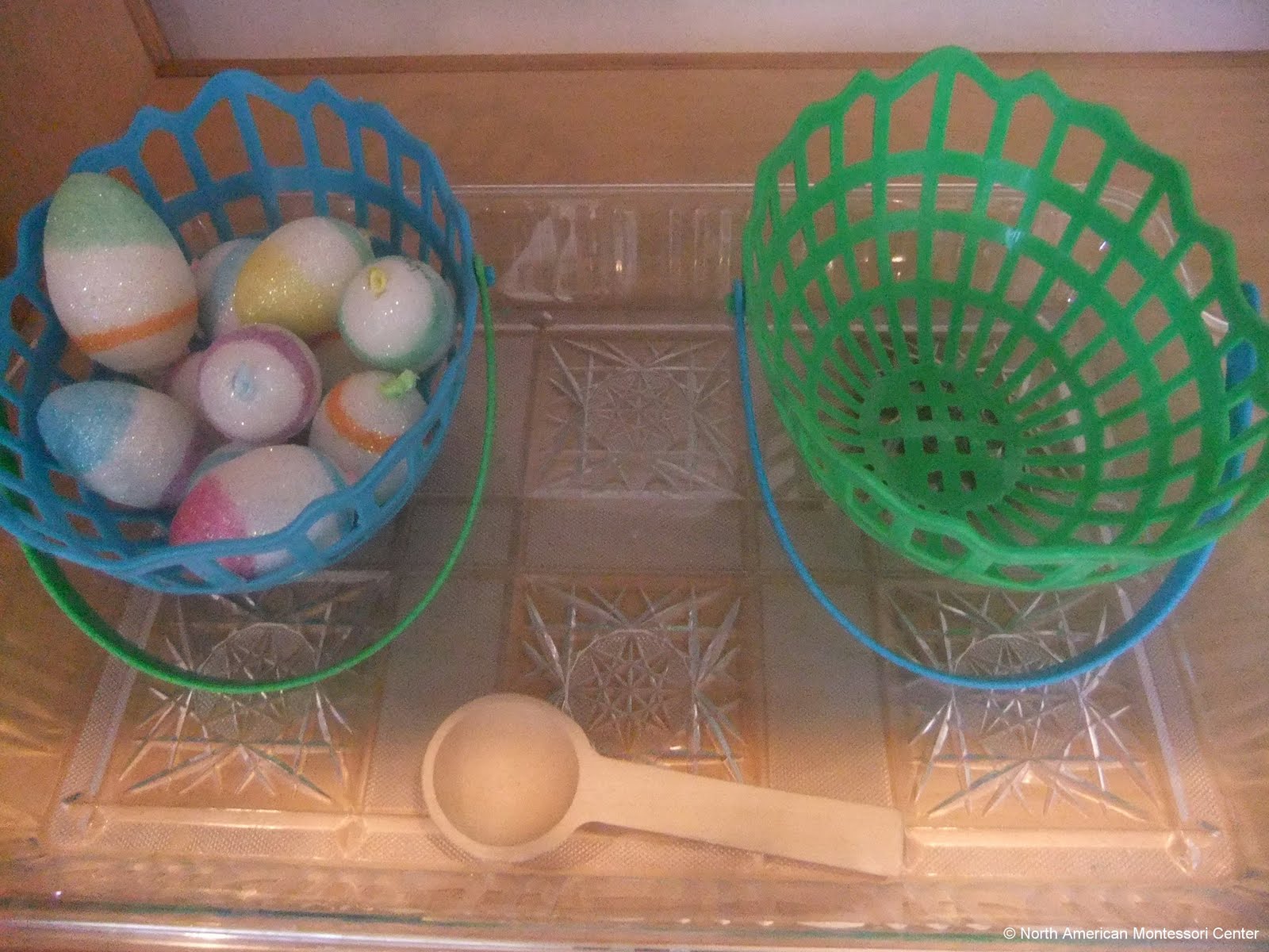 NAMC montessori preschool classroom Easter curriculum activities egg spooning