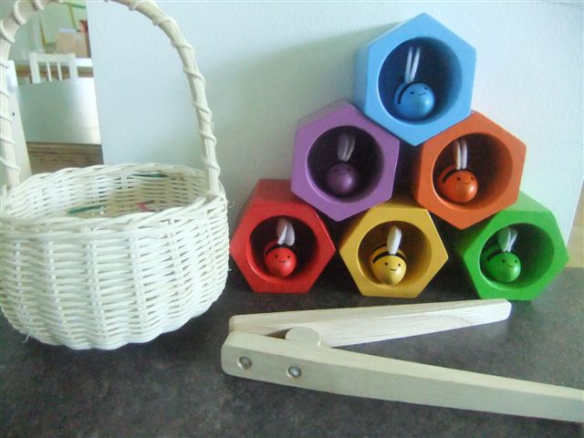 NAMC montessori preschool classroom activities learning about honeybees chopsticks and honeycombs