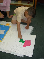 NAMC montessori teacher perspectives prepared environment classroom design state map puzzle