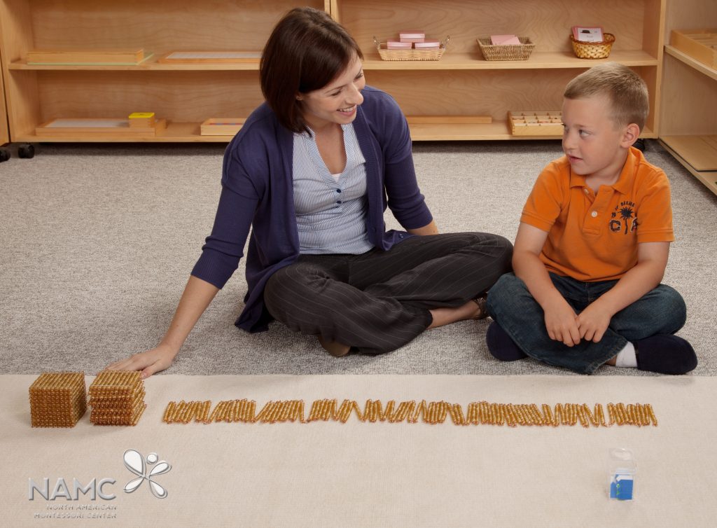 Montessori teacher and student with Thousand Chain