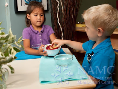 boy and girl work with NAMC montessori materials new montessori students new school year