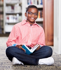 Most rewarding NAMC montessori student boy reading