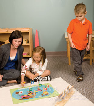 NAMC montessori teacher girl flag game boy waiting rules routines preschool grace and courtesy