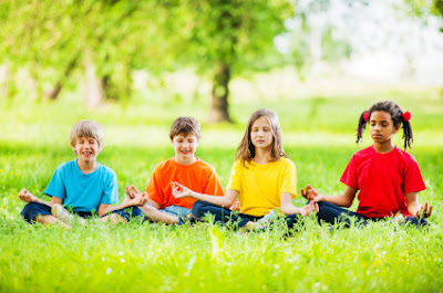 NAMC montessori student children doing yoga international day of peace activities
