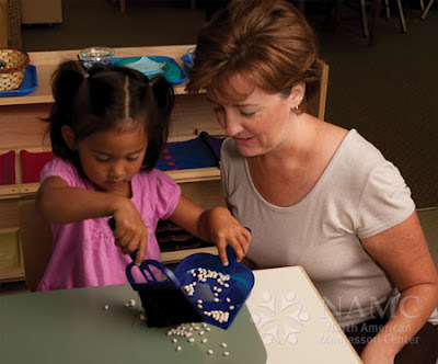 NAMC montessori teacher helps girl montessori away from classroom order relationships