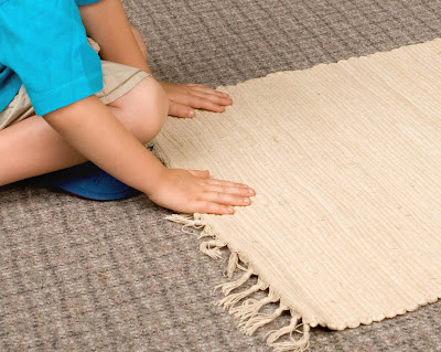 NAMC celebrating montessori week with montessori for our family lifelong learning rolling a mat