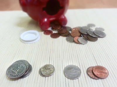 NAMC montessori practical life coin activities money in the classroom sorting piles of coins
