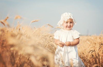 NAMC Montessori and waldorf comparing philosophies education girl in wheat field