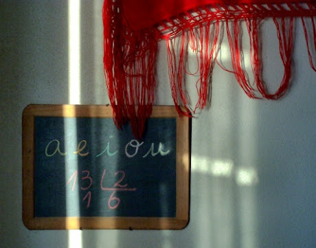 NAMC Montessori curriculum organizing at the beginning of the year mat chalkboard numbers letters