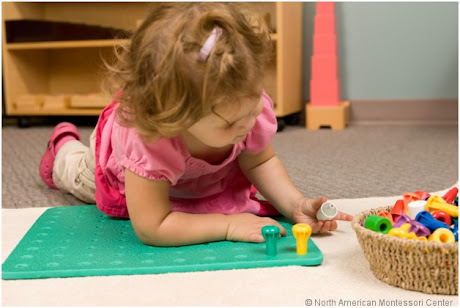 namc adding variety montessori practical life girl using pegs