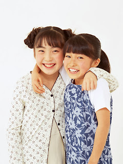 NAMC montessori teaching gratitude two girls hugging