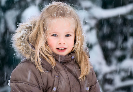 NAMC Montessori Winter holidays around the world cultural celebrations girl in snow