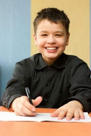 NAMC montessori order of presentations boy writing