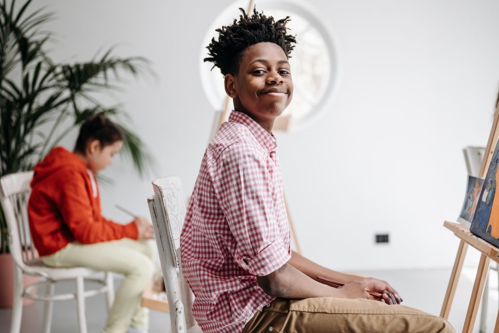 Student looking proudly at camera