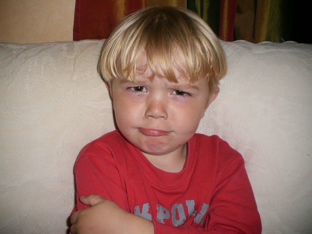 NAMC montessori developing sense of fairness grumpy boy with crossed arms