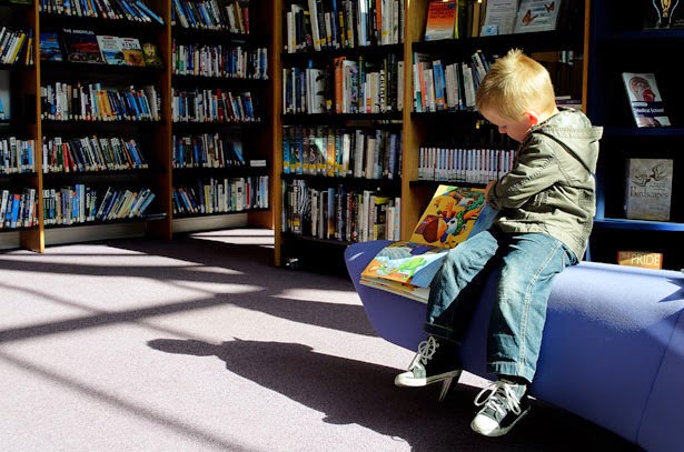 gender and literacy boy in library