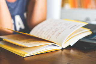 Student with open notebook
