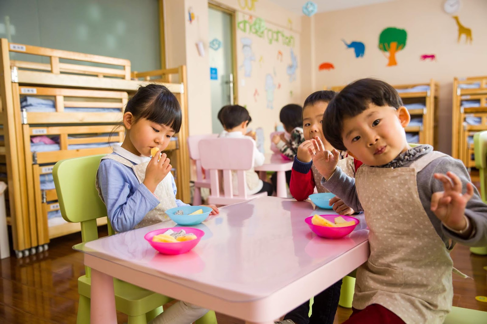 NAMC Montessori cosmic education and world food day. Children having snack.