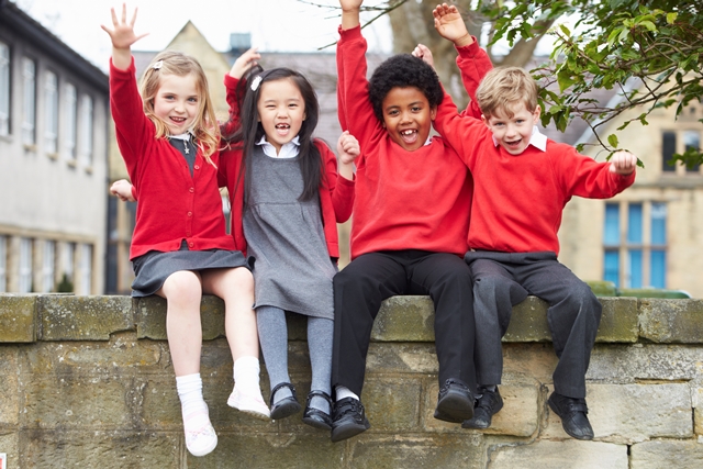 namc montessori lower elementary chemistry happy students sitting on wall