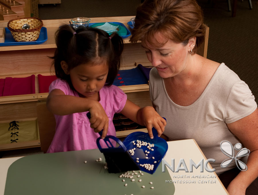namc montessori functionality environment. child using dustpan