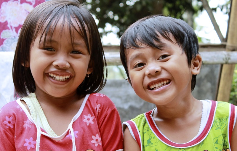 namc montessori second plane of development. two girls laughing