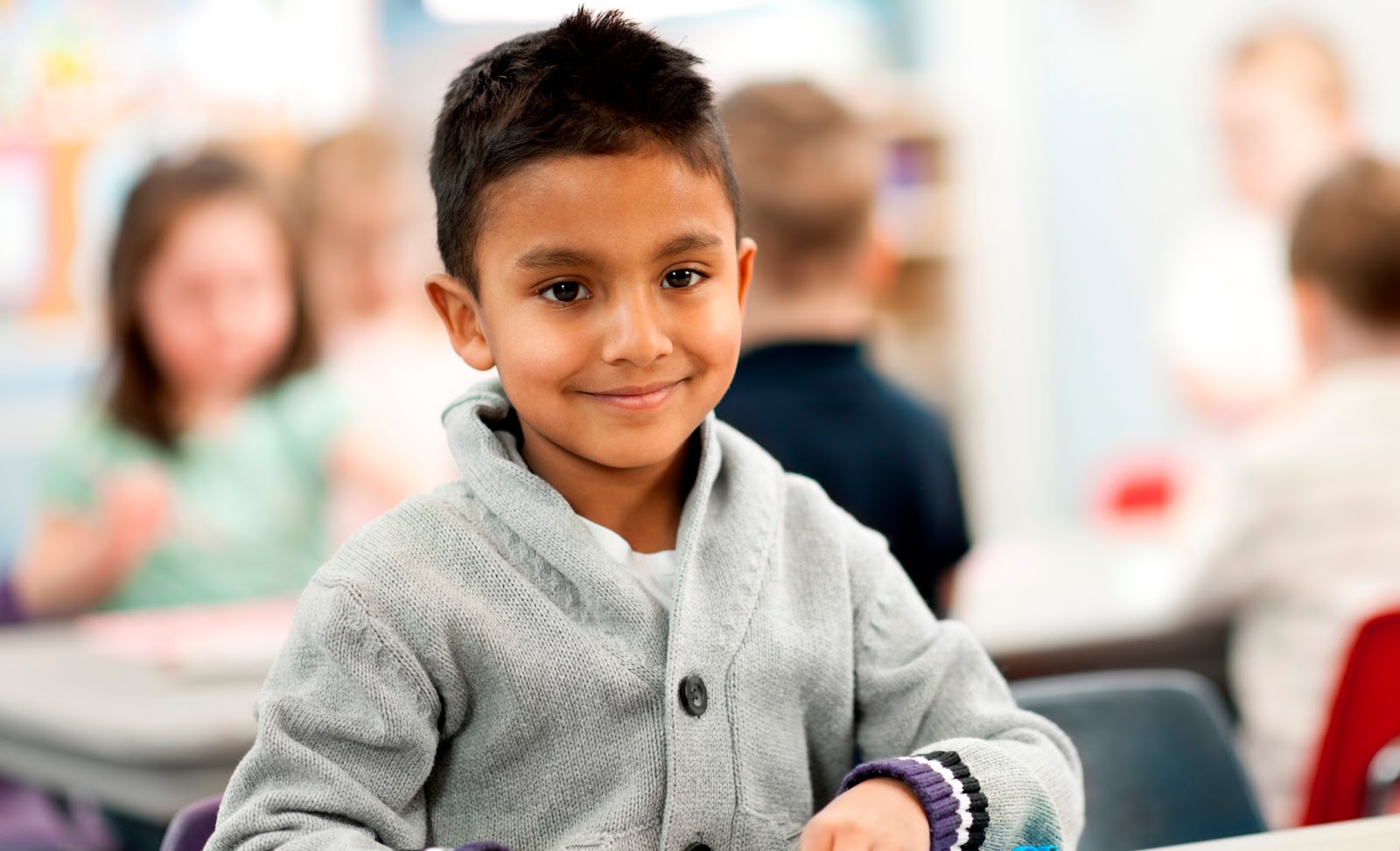 NAMC montessori types of observations in environment smiling boy 